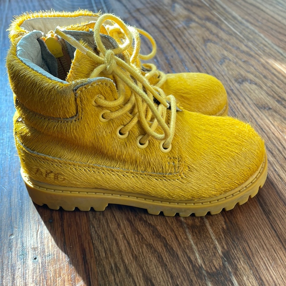 Akid brand faux pony hair boots
